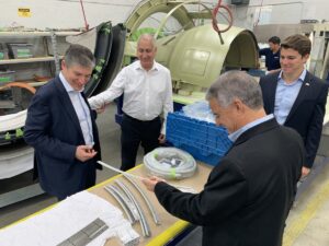 U.S. Rep. Mario Diaz Balart (center) sees work on the Northwings shop floor.